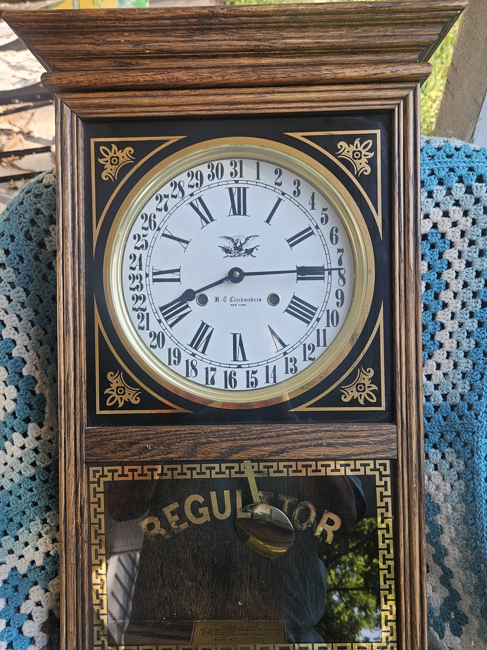 Regulator Wall Clock in Black and Gold by H. C. Clockmakers